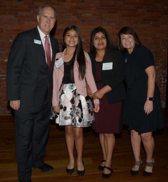 Take Stock in Children Scholarship Recipient and her mother pose with HEF Board Chair Royce Reed, HEF President Kim Jowell
